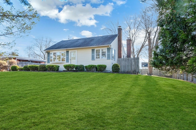 exterior space with a front lawn