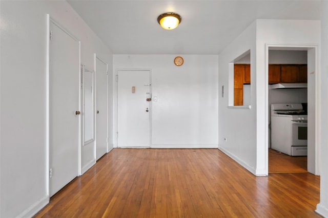 foyer entrance with light wood-type flooring