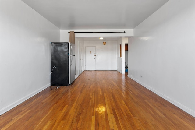 spare room featuring hardwood / wood-style floors