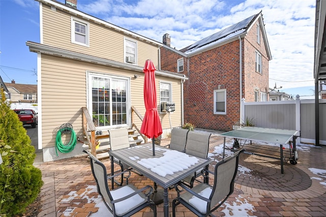 rear view of house featuring a patio