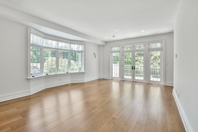 2 Weaver St Unit 3, Scarsdale, NY 10583 - unfurnished room featuring light hardwood / wood-style floors and french doors