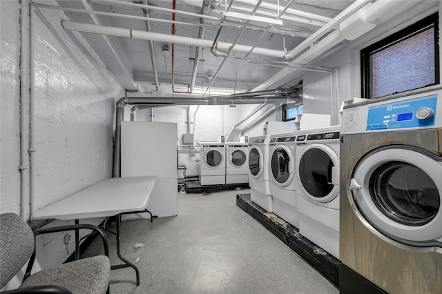 washroom featuring independent washer and dryer