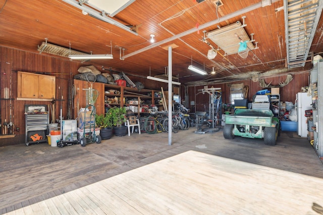 garage with white fridge