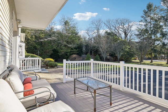 wooden deck featuring an outdoor living space