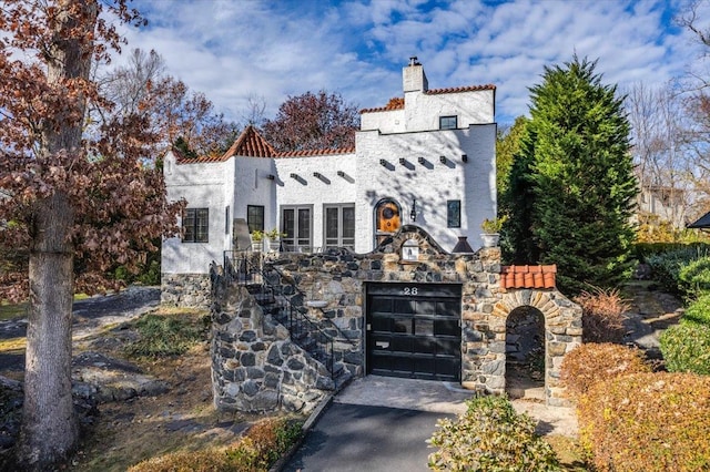 view of front of home with a garage