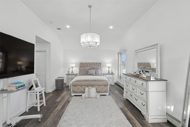 bedroom with dark wood-type flooring, baseboard heating, lofted ceiling, and a notable chandelier