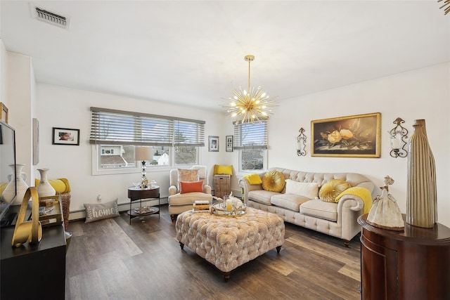 living room featuring dark wood-type flooring and a chandelier