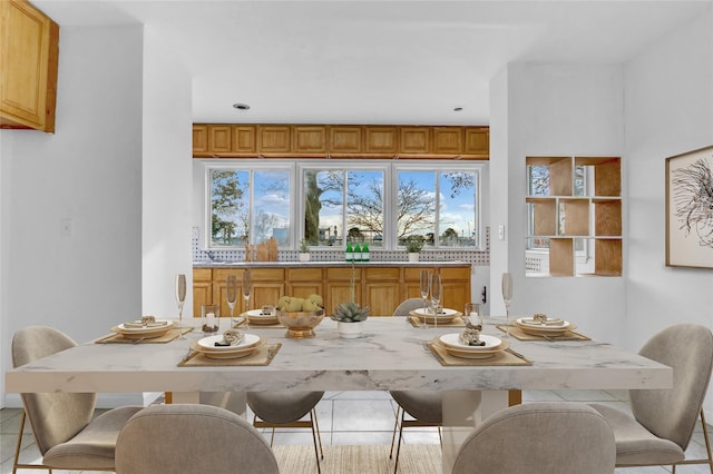 view of tiled dining space