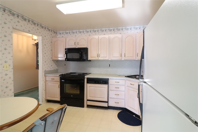 kitchen featuring black appliances