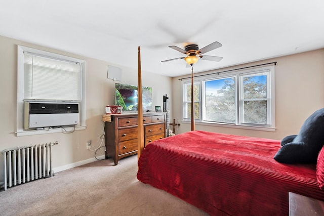 bedroom featuring ceiling fan, cooling unit, radiator heating unit, and carpet floors