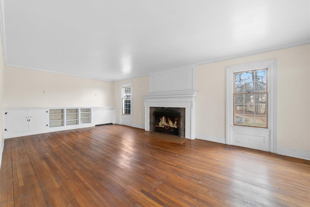 unfurnished living room with hardwood / wood-style floors