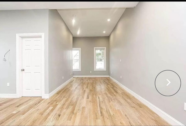 spare room featuring light hardwood / wood-style flooring