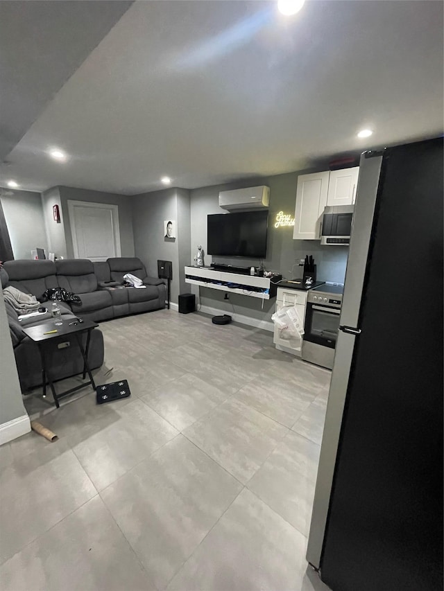 living room featuring a wall mounted air conditioner