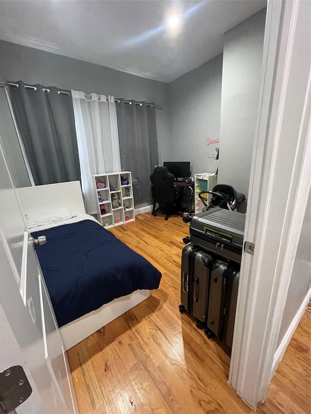 bedroom featuring light hardwood / wood-style floors