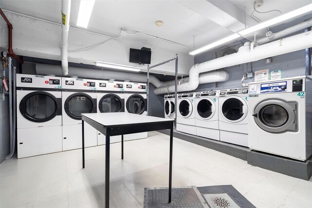 5635 Netherland Ave Unit 4E, Bronx, NY 10471 - clothes washing area featuring washing machine and clothes dryer