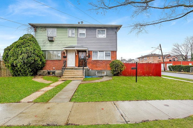 view of front facade with a front yard