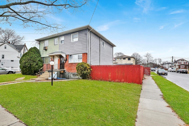 view of front of house with a front lawn