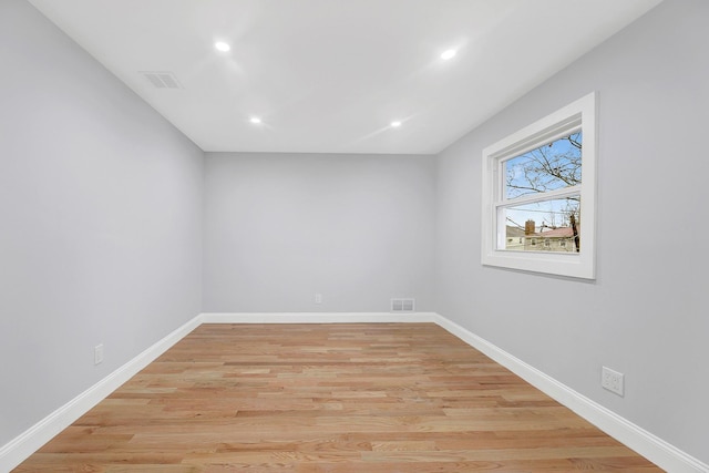 empty room with light wood-type flooring