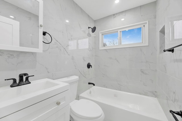 full bathroom with tasteful backsplash, toilet, vanity, tile walls, and tiled shower / bath