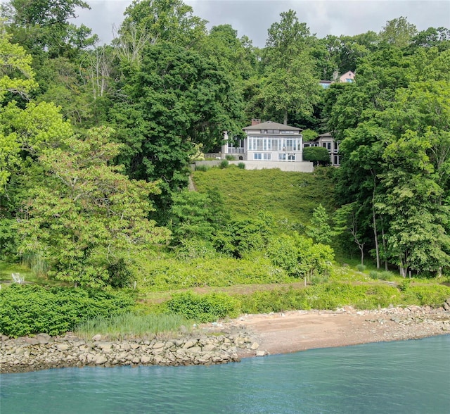 99 Corbett Ln, Palisades, NY 10964 - view of subject property with a forest and a nearby body of water