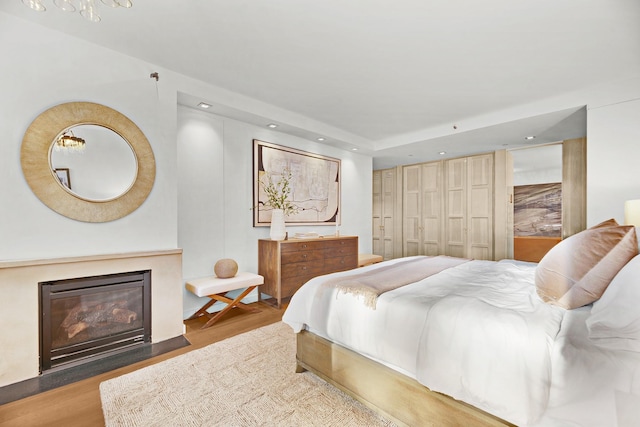 bedroom featuring hardwood / wood-style flooring and a closet