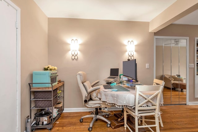 dining room with hardwood / wood-style floors