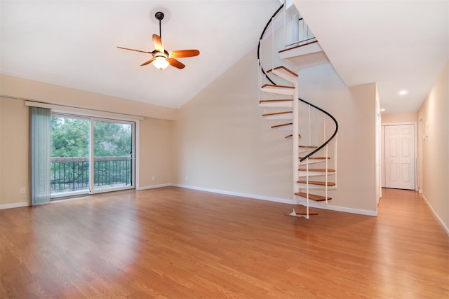 unfurnished living room featuring ceiling fan, light hardwood / wood-style flooring, and high vaulted ceiling