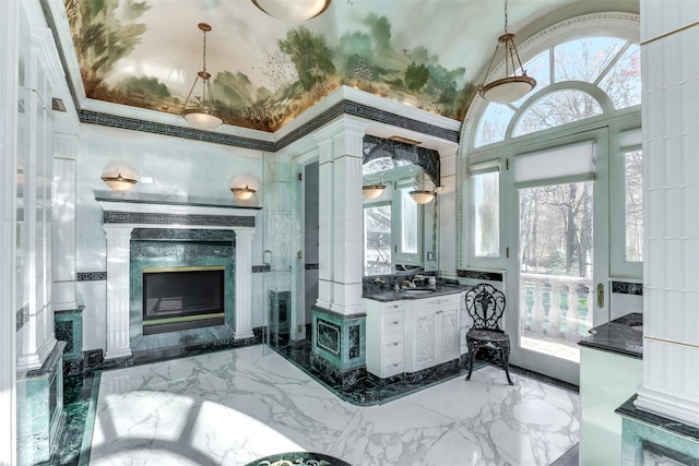 interior space with a high end fireplace and sink