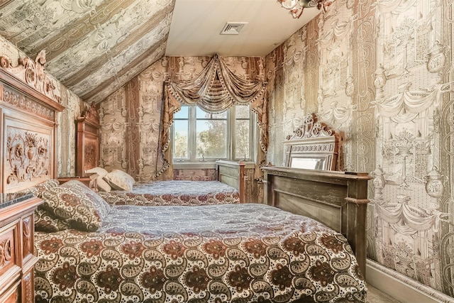 bedroom with vaulted ceiling