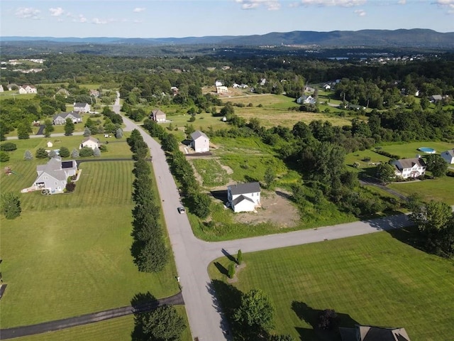 drone / aerial view featuring a mountain view