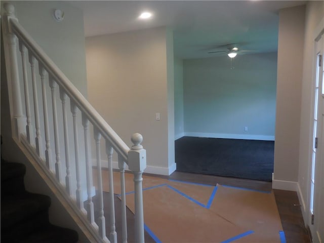 staircase featuring hardwood / wood-style flooring