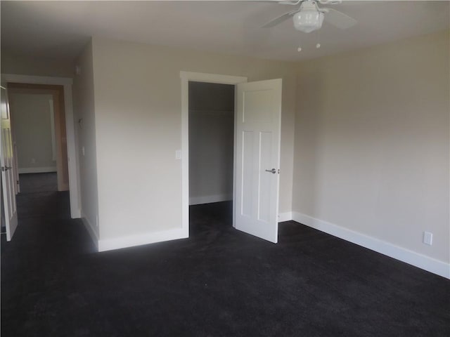 unfurnished bedroom with a closet and ceiling fan