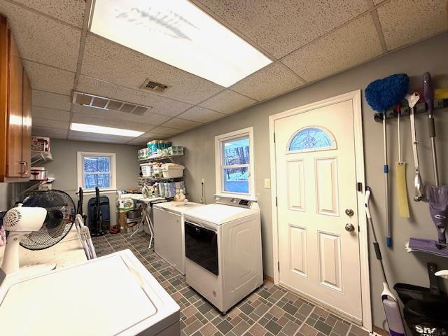 laundry room featuring washer and clothes dryer