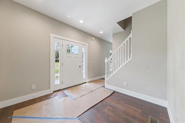 entrance foyer featuring wood-type flooring