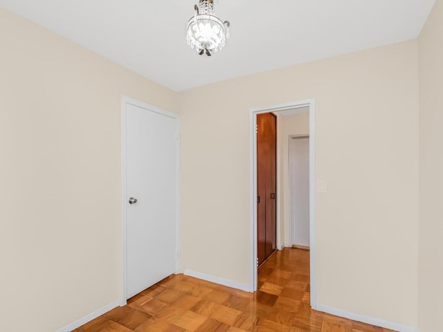 spare room with light parquet floors