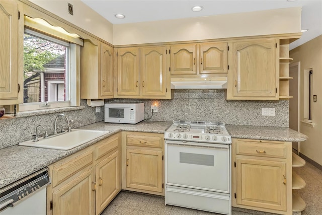 kitchen with white appliances, a sink, open shelves, under cabinet range hood, and light brown cabinetry
