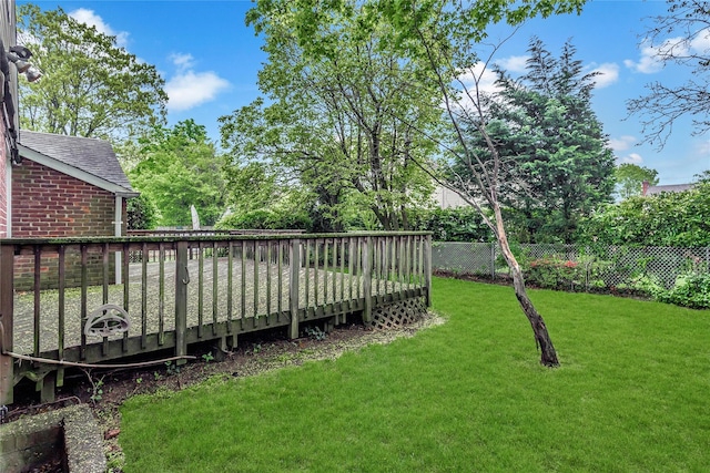 view of yard with a wooden deck