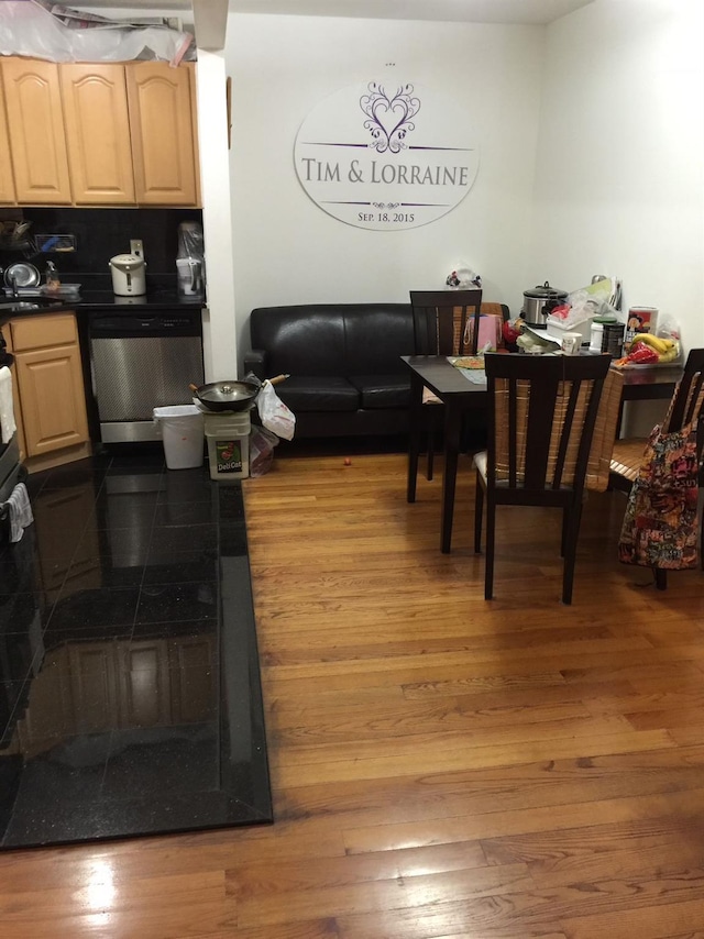 dining space featuring hardwood / wood-style floors