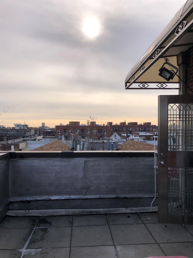 view of balcony at dusk