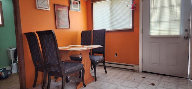 dining room featuring baseboard heating