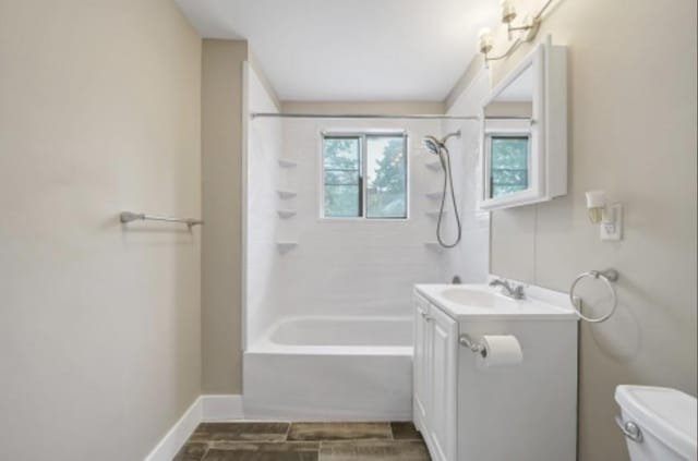 47 Prince St, Middletown, NY 10940 - bathroom with vanity, toilet, shower / tub combination, and baseboards