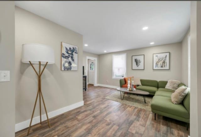 47 Prince St, Middletown, NY 10940 - living room featuring wood finished floors, baseboards, and recessed lighting