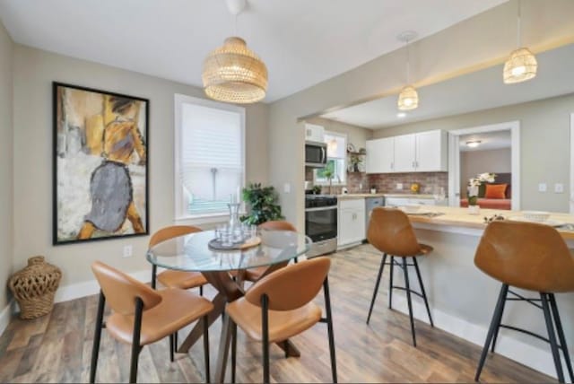 47 Prince St, Middletown, NY 10940 - dining room featuring light wood finished floors and baseboards