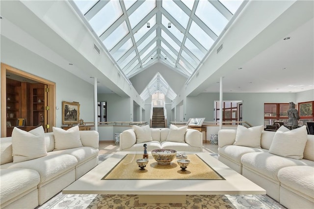 living room featuring a towering ceiling