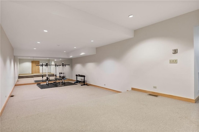 workout area featuring carpet