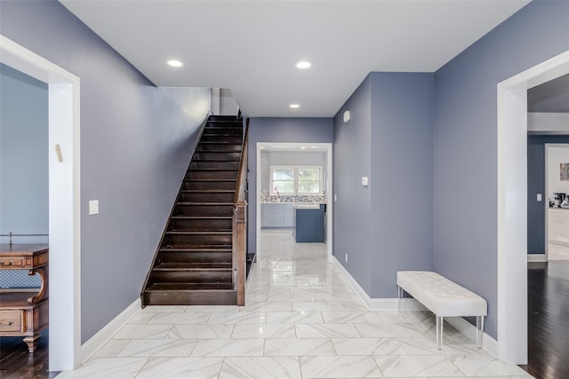 staircase featuring sink