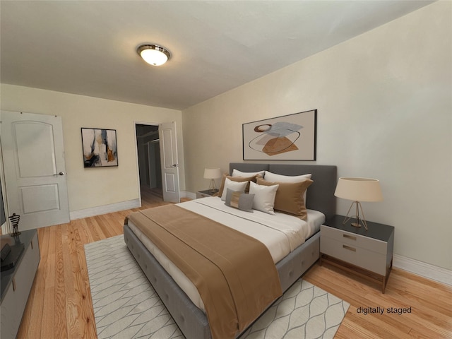 bedroom featuring light hardwood / wood-style flooring