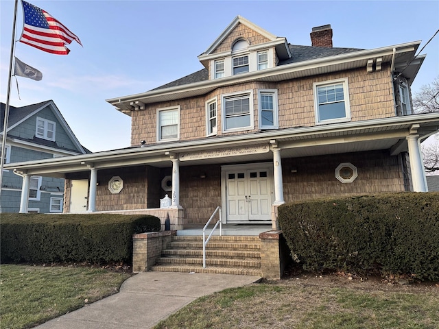 view of front of house with covered porch