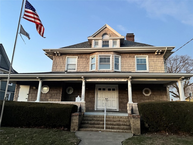 view of front of house featuring covered porch