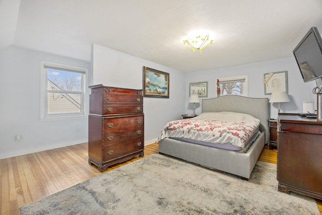 bedroom with light hardwood / wood-style floors